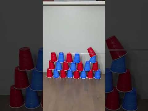 Tower of red and blue plastic cups (reversed, 1.5x speed)