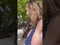 A Girl With Big Breasts On The Beach