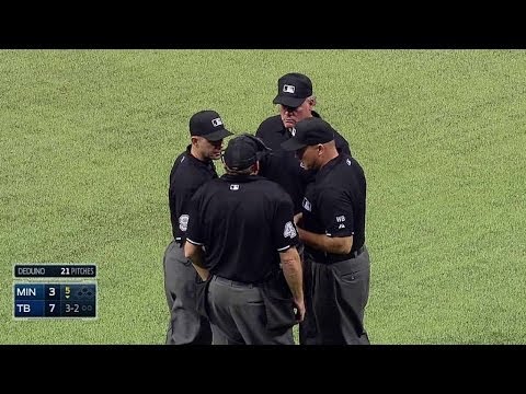 Umpires review the count in the 5th inning