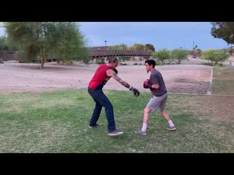 5’10 boxer. Vs 6’6 street fighter