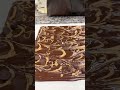 Creamy peanut butter swirled into rich milk or dark chocolate, finished with a sprinkle of sea