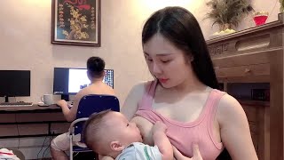 Cute  mom breastfeeding her baby