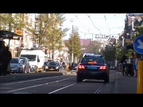 GGD Ambulance 13-108 met spoed onderweg naar het ziekenhuis in Amsterdam