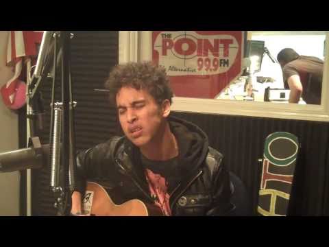 Damato in the 99.9 The Point studio performing 