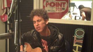 Damato in the 99.9 The Point studio performing 