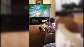 3 Years Old Baby Girl Riding A 3D Rollercoaster In The Living Room