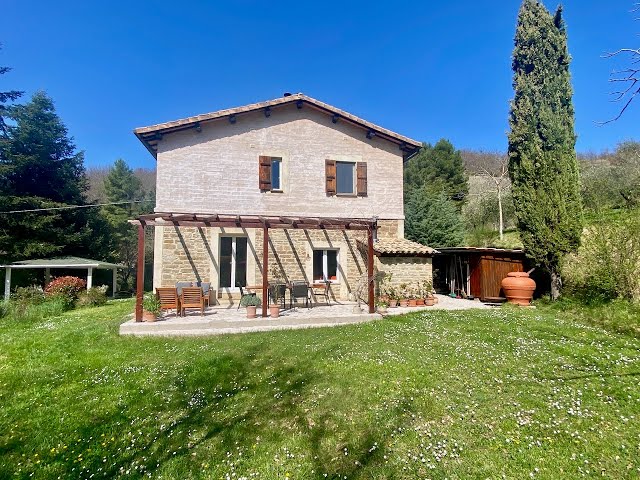 Behind Assisi, restored home in the midst of nature, with B&B rooms and olive grove.