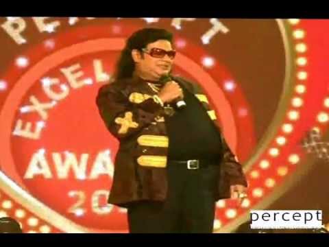 Suresh Menon does the Bappi Da act at Percept Awards