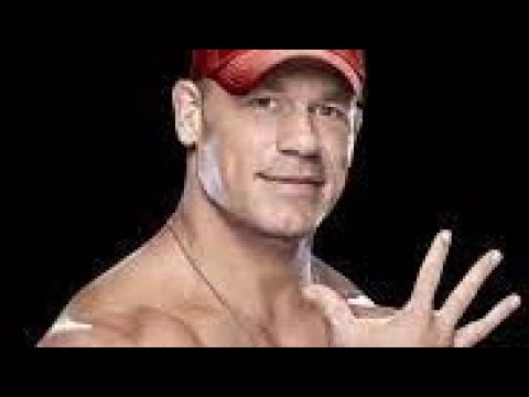 جون سينا يحطم شيمس على أرضية الحلبه