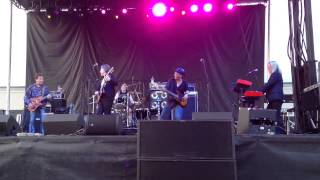 Joey Molland of Badfinger joins Rick Derringer on stage during Hippiefest at Tioga Downs