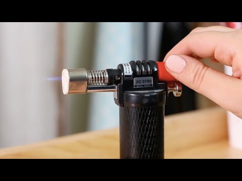 Part of a video titled How to Safely Fill Your Gas Torch At Home - YouTube