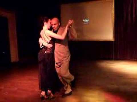  Alessia Lyndin  and  Thierry Le Cocq  are  dancing  to  the  milonga  "  Milonga De Los Fortines  "