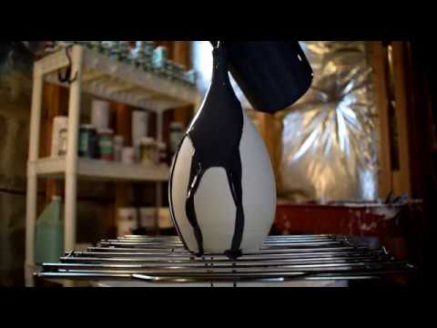 Pouring slip over a teardrop vase