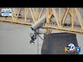 Harrowing video shows truck dangling over Ohio River after crash on bridge
