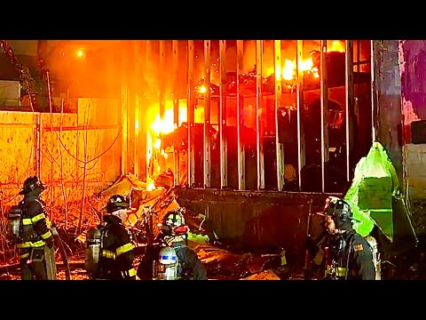 FDNY BOX 7435~FDNY BATTLING A 2ND ALARM FIRE IN A AUTO REPAIR SHOP ON 21STREET USING FOAM OPERATIONS