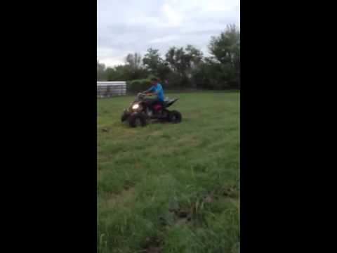 Luis doing wheelie on raptor 700