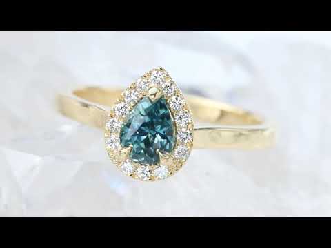 Teal Sapphire and Diamond Halo Ring in 18ct Gold