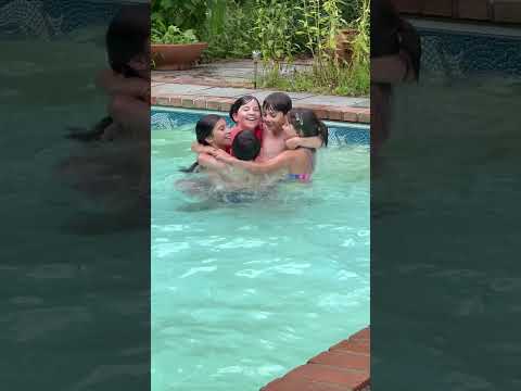 Happy Cousins Swimming in grandma’s pool - The Burriesci Family