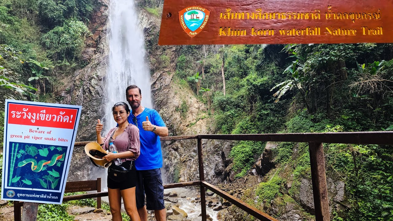 Join travelers as they venture to the awe-inspiring Khun Korn Waterfall in this video.