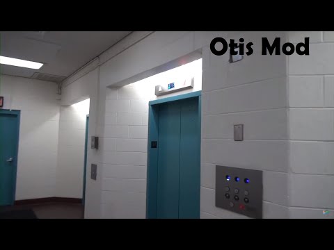 Glass Otis Traction Elevators at the Ross Tower Garage in Dallas, TX