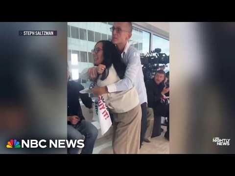 Fashion CEO physically restrains PETA protestors during runway showr