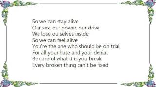 Garbage - So We Can Stay Alive Lyrics