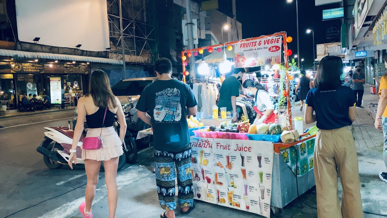 Embark on a walking tour through Chiang Mai's vibrant Night Bazaar.