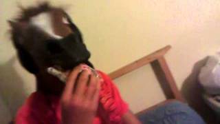 Drew hits josh in a horse mask