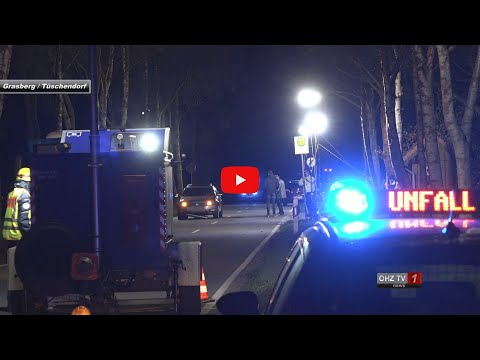 Child runs out from behind a bus and is hit by an oncoming car.