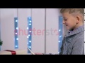 Young Boy Using Touchscreen Tablet Technology Turns The Digital Tablet In The Hands Of Seeing It