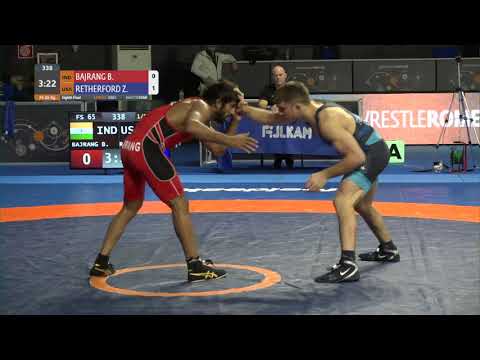 1/8 FS - 65 kg: B. BAJRANG (IND) v. Zain Retherford (USA)