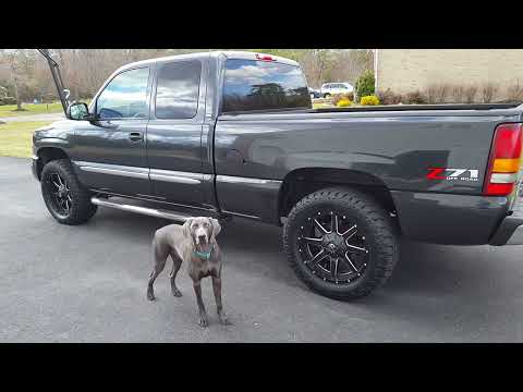 2003 GMC Sierra 1500 with Fuel Maverick rims and Toyo tires