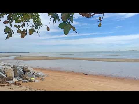 nice, unspoilt sandy beach with golden sands in melaka.