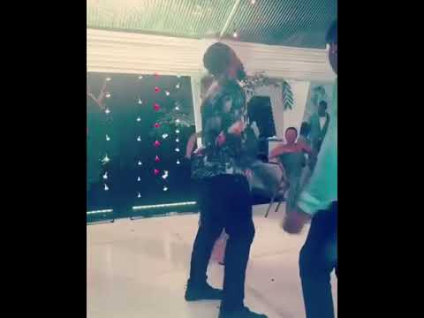 Tammy chin and Wayne Marshall busting some dance moves