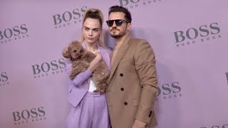 Cara Delevingne, Orlando Bloom and more pose for the photographers before the Hugo Boss show