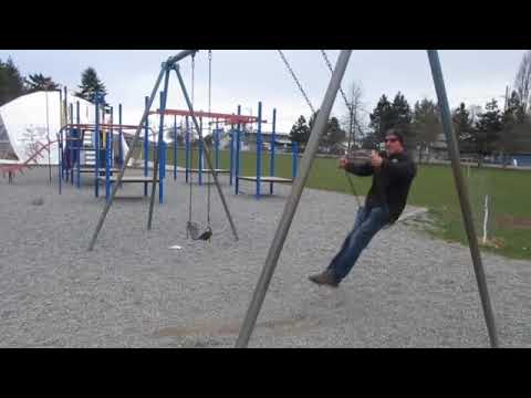 Banana Joe on Swing Set . Salt Spring Island . Canada