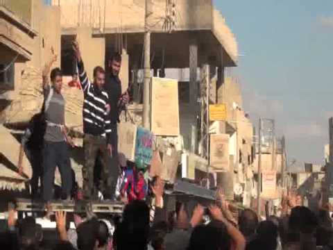 مظاهرة أثناء تشييع عناصر من كتيبة صدام حسين في الميادين