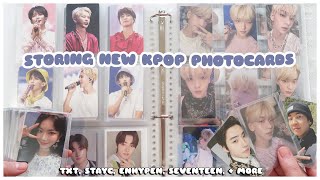 ☁️ organizing + storing new kpop photocards in my binders | txt, enhypen, seventeen, + stayc a5 mini