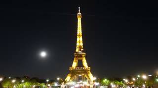 4k Eiffel Tower at Night. 1-hour video with Relaxing City Sounds. Cozy