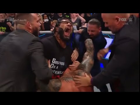 Roman Reigns guillotine on Riddle and Randy Orton