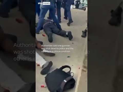 Moment gunmen open fire on Bondi Beach