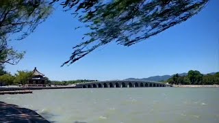 With WestChinaGo . . . With BeijingBuzzz . . . With Ross . . . With China Walking Tour . . . With Chris . . . Summer Palace Visitor Guide - BeiJing Overview The Summer Palace, located in the HaiDian district of Beijing, is a vast ensemble of lakes, gardens, and palaces. It served as a royal garden and retreat for the Qing Dynasty emperors and is now a UNESCO World Heritage Site. Getting There Location: 19 XinJianGongMen Road, HaiDian District, Beijing, China. Public Transport: Subway: Line 4, Beigongmen Station (North Palace Gate), Exit D. Alternatively, Line 10, Xiyuan Station, Exit C2. Bus: Several bus lines stop near the Summer Palace, including routes 303, 330, 331, 332, 346, 508, 579, and 584. Opening Hours April 1 to October 31: 6:30 AM to 6:00 PM (ticket sales and last entry at 4:00 PM) November 1 to March 31: 7:00 AM to 5:00 PM (ticket sales and last entry at 3:00 PM) Tickets April 1 to October 31: Entrance Fee: ¥30, Through Ticket (includes Dehe Garden, Tower of Buddhist Incense, Suzhou Street, and Wenchang Hall): ¥60 November 1 to March 31: Entrance Fee: ¥20, Through Ticket: ¥50 Main Attractions The Summer Palace is rich with historical and cultural sites. Here are some of the main attractions: Kunming Lake: This large lake dominates the Summer Palace and is ideal for boating. It covers about three-quarters of the park`s area. Longevity Hill: Standing 60 meters high, it provides excellent views of the lake and surrounding area. Important buildings such as the Tower of Buddhist Incense are located here. Seventeen-Arch Bridge: A long, beautiful bridge that connects the eastern shore of Kunming Lake to Nanhu Island. Long Corridor: A 728-meter-long covered walkway decorated with intricate paintings, connecting the Hall of Dispelling Clouds to the Marble Boat. Marble Boat: A lakeside pavilion built from marble and wood, symbolizing stability and the enduring nature of the Qing Dynasty. Hall of Benevolence and Longevity: The administrative center of the Summer Palace, where Empress Dowager Cixi handled state affairs. Suzhou Street: A charming area designed to resemble the canals and traditional shops of Suzhou, complete with waterways and bridges. Activities Visitors to the Summer Palace can engage in various activities: Boating: Rent a paddleboat or take a dragon boat tour on Kunming Lake. Walking and Hiking: Stroll along the scenic paths, the Long Corridor, or hike up Longevity Hill for panoramic views. Photography: Capture the stunning architecture, landscapes, and historical sites. Guided Tours: Join a guided tour to learn more about the history and significance of the Summer Palace. Dining and Refreshments Several cafes and snack stalls are available within the Summer Palace, offering light refreshments, drinks, and local snacks. For a more substantial meal, visitors can dine at restaurants near the park entrances. Visitor Tips Best Time to Visit: Spring and autumn are the best times to visit due to the pleasant weather. Summer can be very hot, and winter can be quite cold. Wear Comfortable Shoes: The Summer Palace is vast, and exploring it involves a lot of walking. Stay Hydrated: Bring water, especially during the hotter months. Respect the Site: The Summer Palace is a cultural heritage site. Avoid touching artifacts, stay on marked paths, and do not litter. Plan Your Visit: Due to its size, plan which sections you want to visit in advance to make the most of your time. Nearby Attractions Old Summer Palace (Yuanmingyuan): Located nearby, this former imperial garden offers ruins and beautiful landscapes to explore. Beijing University: One of China’s most prestigious universities, known for its beautiful campus and Weiming Lake. Tsinghua University: Another top university in China, with an expansive and scenic campus. Conclusion The Summer Palace in Beijing is a magnificent site rich in history, culture, and natural beauty. Whether you`re interested in Chinese history, stunning architecture, or beautiful landscapes, the Summer Palace offers a memorable and enriching experience. The awesome and beautiful Summer Palace in BeiJing