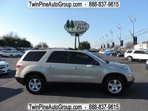 How to fold down the middle row seats on a 2012 GMC Acadia