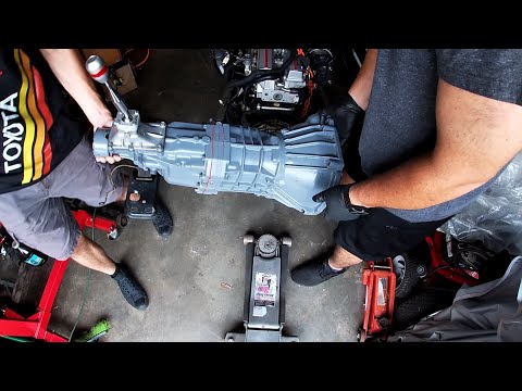 w58 bushing kit,shifter,throwout bearing and install transmission onto the 7mgte
