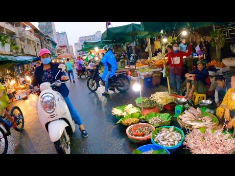 Rainy walking tour at Toul Tom Poung Market buying food - Cambodian street food 2022