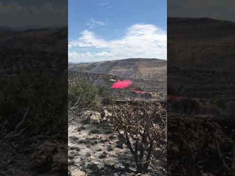 Fire Fighting Plane Pilot Is Too Focused On Putting Out Fire, Almost Crashes Into Mountain