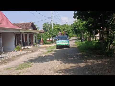 Penyemprotan disinfektan di jalan Pandeyan