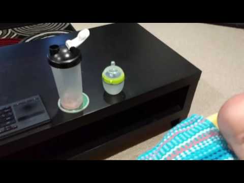 Baby Schwarzenegger tries to arm wrestle daddy.