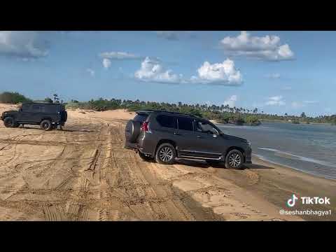 pradooo and defender in beach