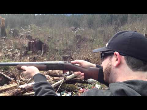 Shooting a TV with a 12 gauge shotgun. Solid slug rounds.